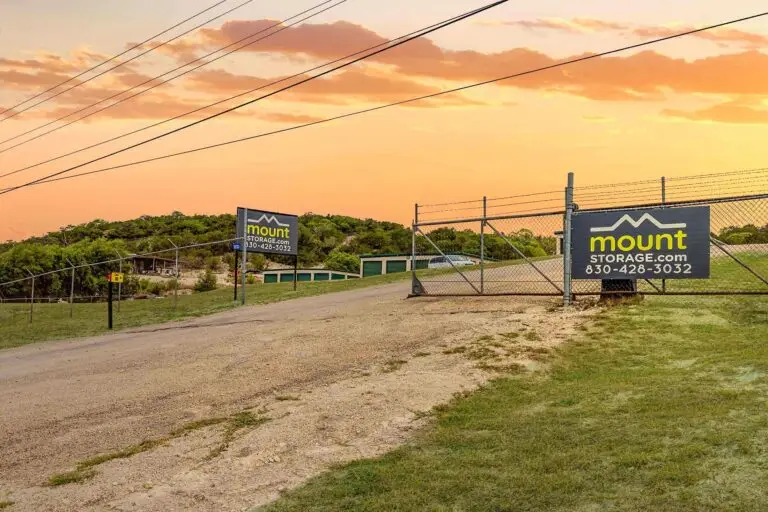 Gated entrance and sign at Mount Storage Kerrville on Medina Highway