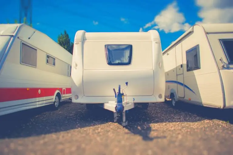 RVs parked in an outdoor storage lot